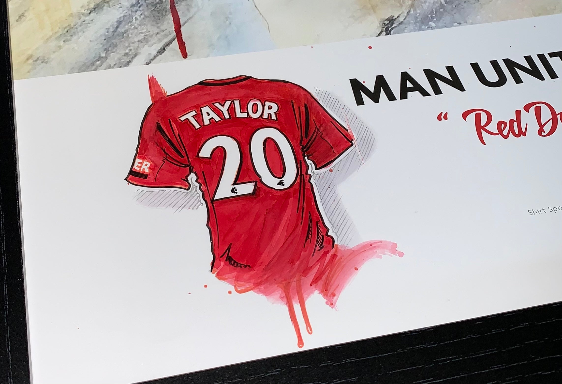 Load video: Video of Terry painting a personalised limited edition Manchester United Art Print