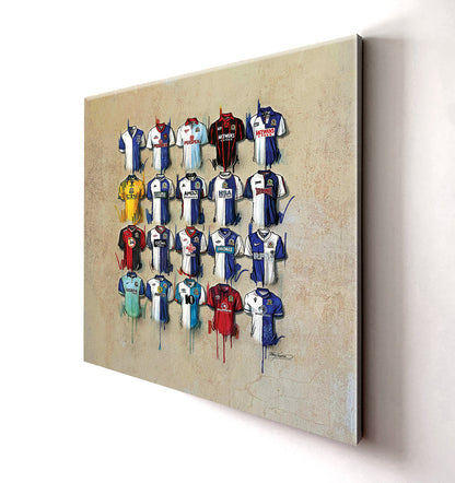 Blackburn Rovers Canvases by Terry Kneeshaw come in various sizes, including 20x20, 30x30, and 40x40. Each canvas is available in either a framed or unframed black floating frame. The artwork features a captivating abstract composition with bold colors and textures that pay tribute to the legendary Blackburn Rovers team. Perfect for any Blackburn Rovers fan or football enthusiast, these canvases are a great addition to any room and are sure to inspire admiration and nostalgia.