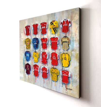 Arsenal Gunners Canvases by Terry Kneeshaw are a collection of striking artworks that come in a variety of sizes, including 20x20, 30x30, and 40x40. Each canvas is available in either a framed or unframed black floating frame. The artwork features a visually dynamic abstract composition with bold, bright colors and textures that pay homage to the iconic Arsenal Gunners team. Perfect for any Arsenal fan, these canvases are a great addition to any room and are sure to impress.
