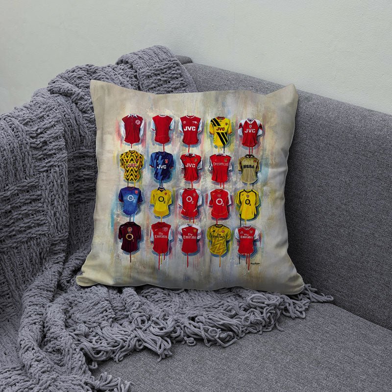 Cushions featuring football shirt artwork by Terry Kneeshaw, combining comfort with designs for your home decor.