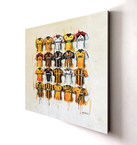 These Hull City Canvases by Terry Kneeshaw are a great addition for any fan of the team. The various size artworks are available in a choice of 20x20, and can be ordered in framed or unframed black floating frames. The canvases feature the team's logo and colours, making them a perfect way to show your support for the Tigers in your home or office.