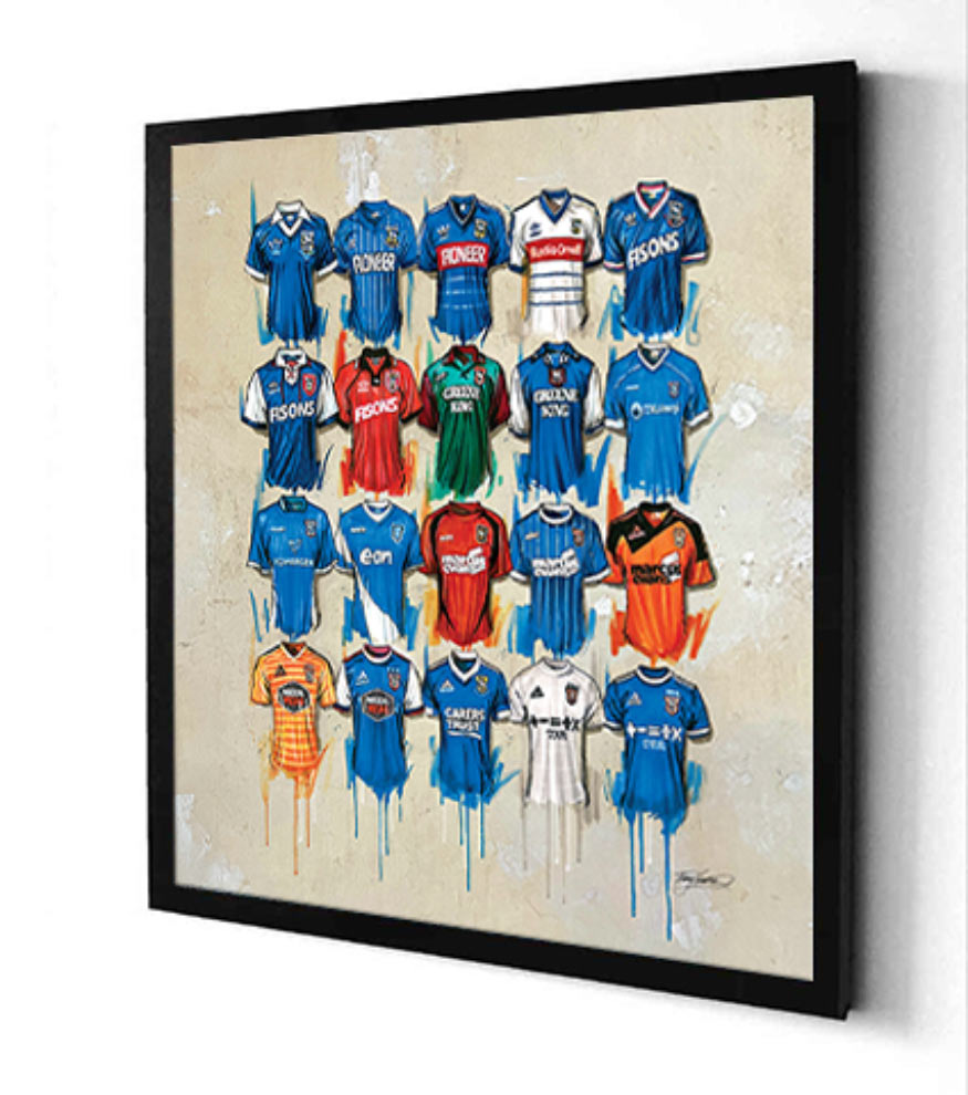 These stunning Ipswich Town Football Club canvases by Terry Kneeshaw are available in various sizes including 20x20. The canvases are framed or unframed with a black floating frame. The art pieces capture the beauty of the club's logo, emblem, and stadium. A perfect way to display your support for the Tractor Boys in your living room, bedroom or office.